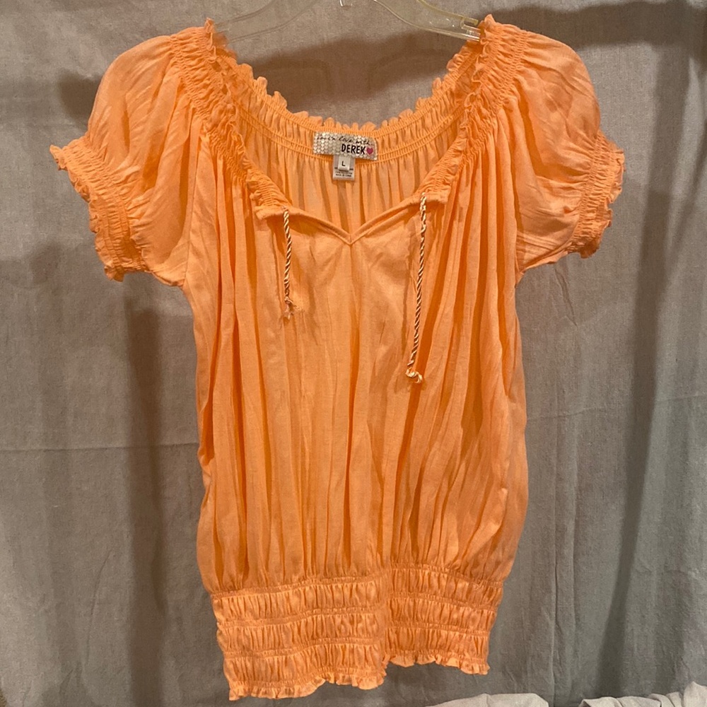 Peach colored stretchy top